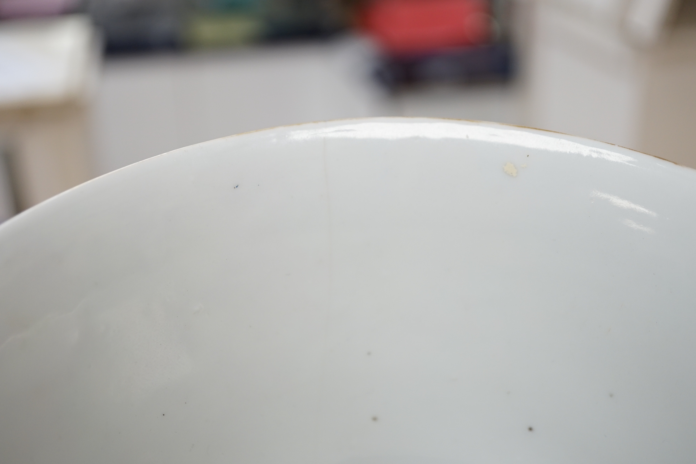 A Chinese 'Thousand Flower' enamelled porcelain bowl, Qianlong mark, early 20th century on hardwood stand, 17cm high